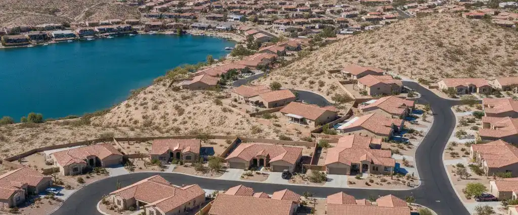 Well-maintained residential rooftops in Lake Havasu City, Mohave County, Arizona, with arid desert mountains near the Colorado River