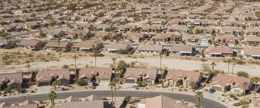 Well-maintained residential rooftops across Nevada, with arid mountains in the distance